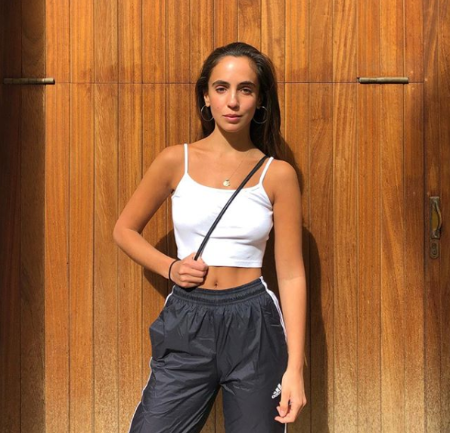 gianna wearing white top and sweats 